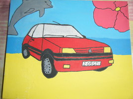 Promenade en bord de mer avec la 205 GTI rouge