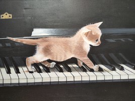 chaton jouant du piano