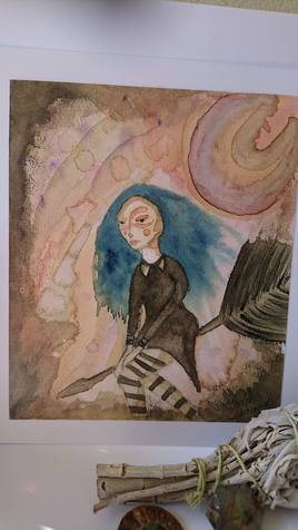 Sorcière volant sous la lune