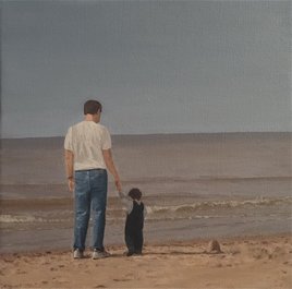 Sur la plage au Touquet, père et fils