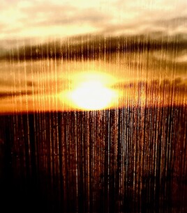Le soleil à travers la vitre