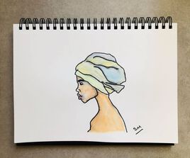 La mujer con turbante de colores