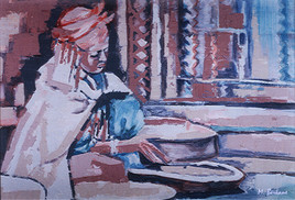 Femme chaoui confectionant le couscous