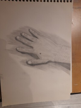 La main cr&eacute;ative.