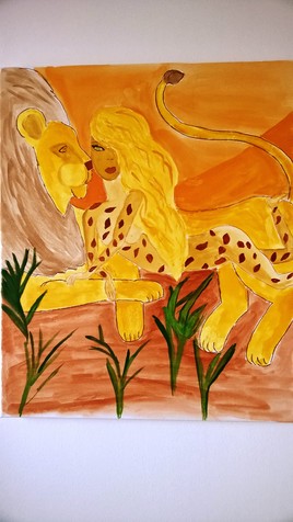 la femme léopard et le lion