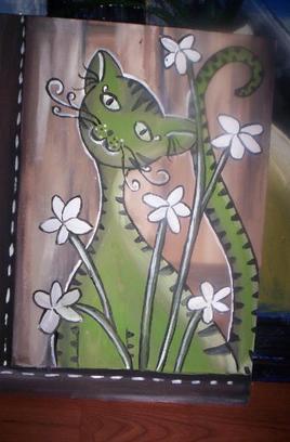 chat vert aux fleurs