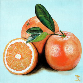 Trois orange sur fond bleu