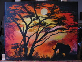 le coucher de soleil et l'éléphant