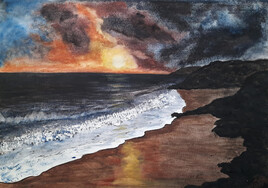 "Waves, foam and rocks at sunset"