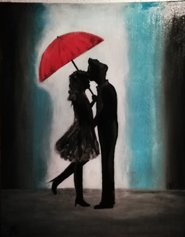 embrassade sous un parapluie
