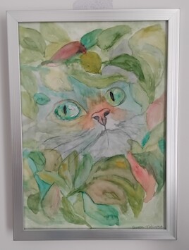 Le chat dans les feuilles