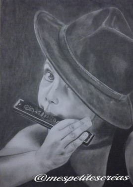 l'enfant &agrave; l'harmonica