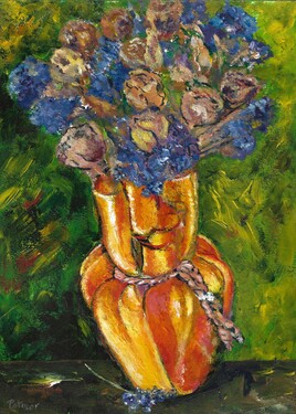 Fleurs séchées dans un vase coloré