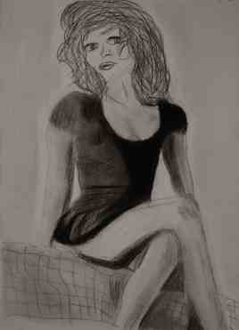 femme assise sur un lit